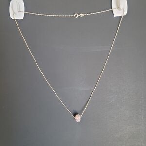 Elegant Gold Necklace with Pink Pendant